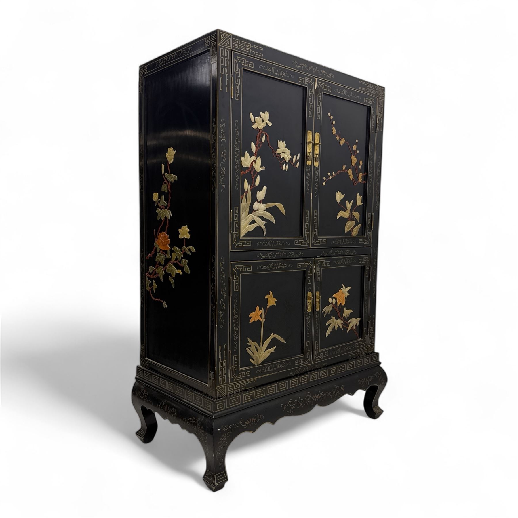 Late 20th century Chinoiserie black lacquer cabinet, the rectangular body decorated with hand-painted floral and foliate motifs in polychrome and gilt, fitted with four panel doors enclosing shelved interior, on shaped apron and stylised cabriole supports with gilt scrollwork