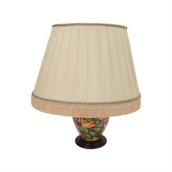 Moorcroft table lamp in Flame of the Forest pattern, of baluster form, on stepped wooden base, H35cm (excluding fitting)