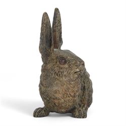In the manner of Franz Bergman, seated hare, late 19th/early 20th century Austrian cold painted bronze, with indistinct impressed mark beneath, H8cm L9.5cm