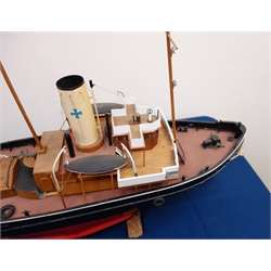  Large scale model of the Tug Joffre, on wooden stand, built from Model Boats Plans Service, L93cm, H54cm: Built Ardrossan and completed in 1916 No.135730 on Admiralty service 1917, then later chartered to Tyne Tugs Ltd. broken up in March 1966  