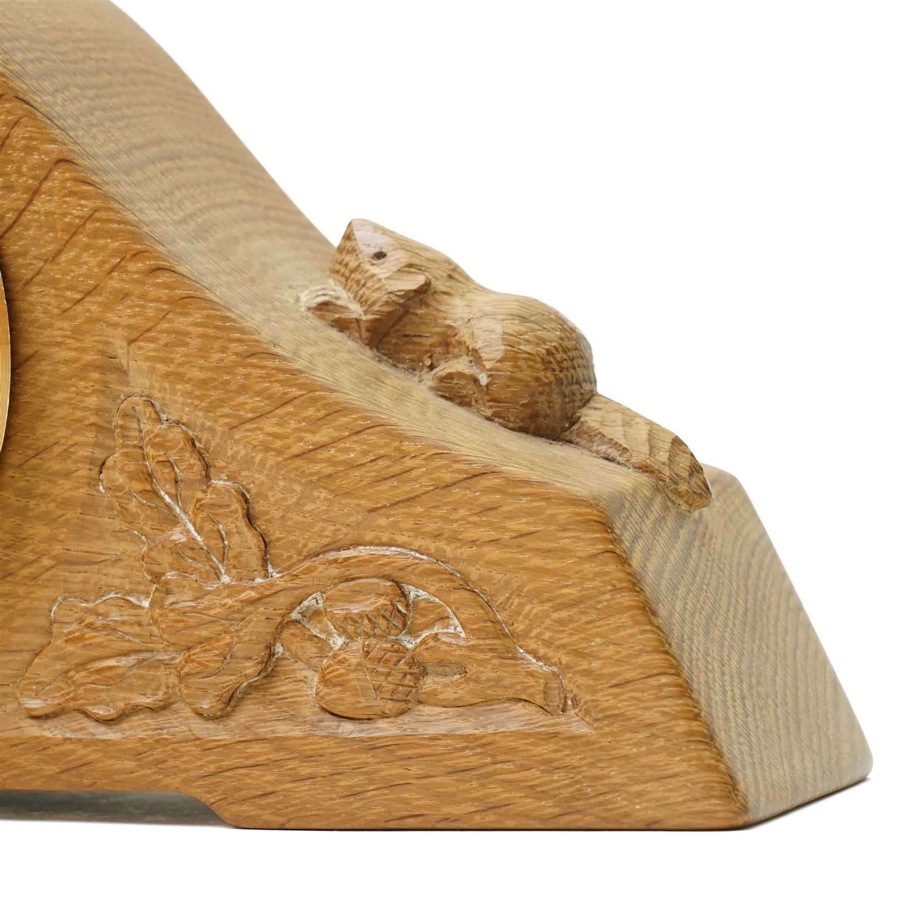 Beaverman - oak arched top mantel clock, with acorn and oak leaf carvings to spandrels, fitted with Hermle Quartz movement with Roman dial, with carved beaver signature, by Colin Almack of Sutton near Thirsk