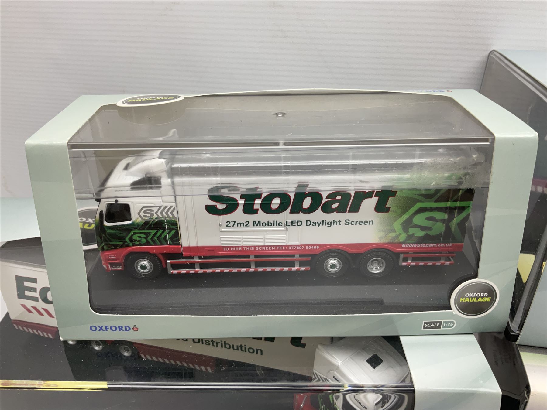 Oxford Die-Cast Eddie Stobart - nine various lorries in the Oxford Haulage series including special and limited editions; all in perspex display cases and boxes (9)