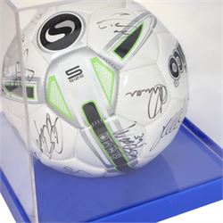 Sondico football signed at the Den by the Millwall football team December 2012, contained within a Perspex display case