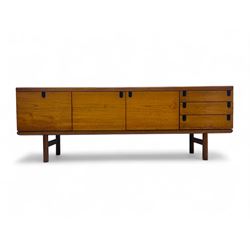 White & Newton - mid-20th century teak sideboard, rectangular top with raised back over fall-front storage compartment, double cupboard and three drawers, raised on cylindrical supports