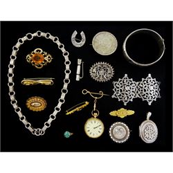 Victorian and later silver jewellery including book link chain necklace, horseshoe brooch, belt buckle and a Christmas cracker brooch, Chinese silver one Yen coin brooch, gold jewellery including fob watch, stamped 14K, 9ct gold brooches, 8ct gold brooch and a gilt brooch