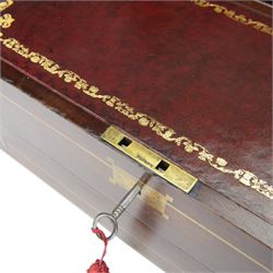 19th century brass bound mahogany writing slope with twin drop carry handles to sides, the hinged cover opening to reveal a  gilt tooled burgundy leather slope and compartmented interior, H22xm W50.5cm D30cm