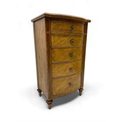Frank Hudson - mid-20th century Mindi ash and burr walnut bow-fronted lingerie chest, crossbanded hinged top concealing vanity mirror, over five graduated cockbeaded drawers, raised on turned supports