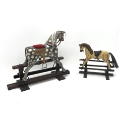  Dappled grey rocking horse with bridles, saddle and stirrups on trestle base (L118cm) and a small rocking horse (L72cm)  