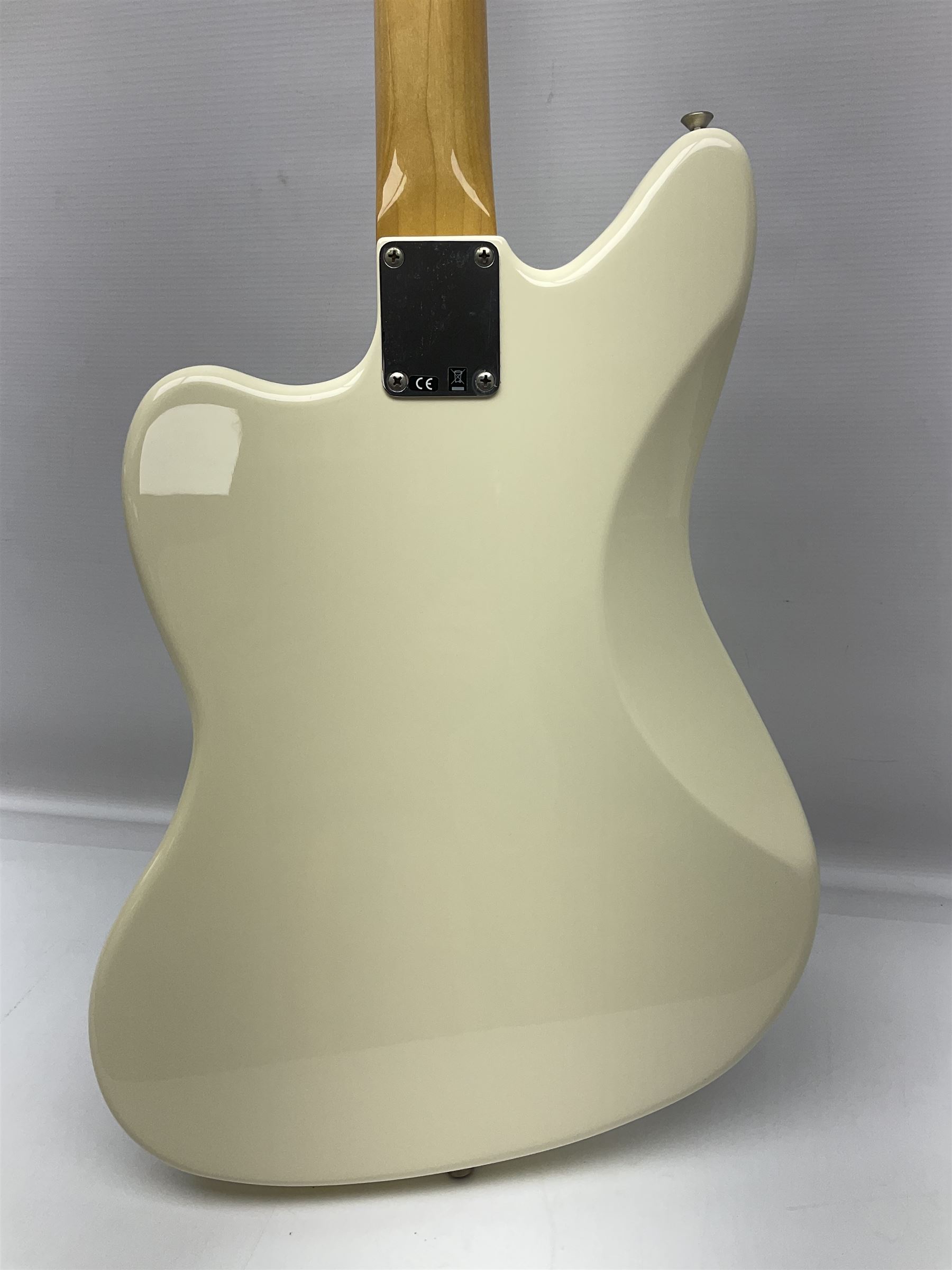 Mexican Fender Jaguar electric guitar with Humbucker pick-ups and tremolo arm, serial no.MX16741977, L101cm; in soft carrying case