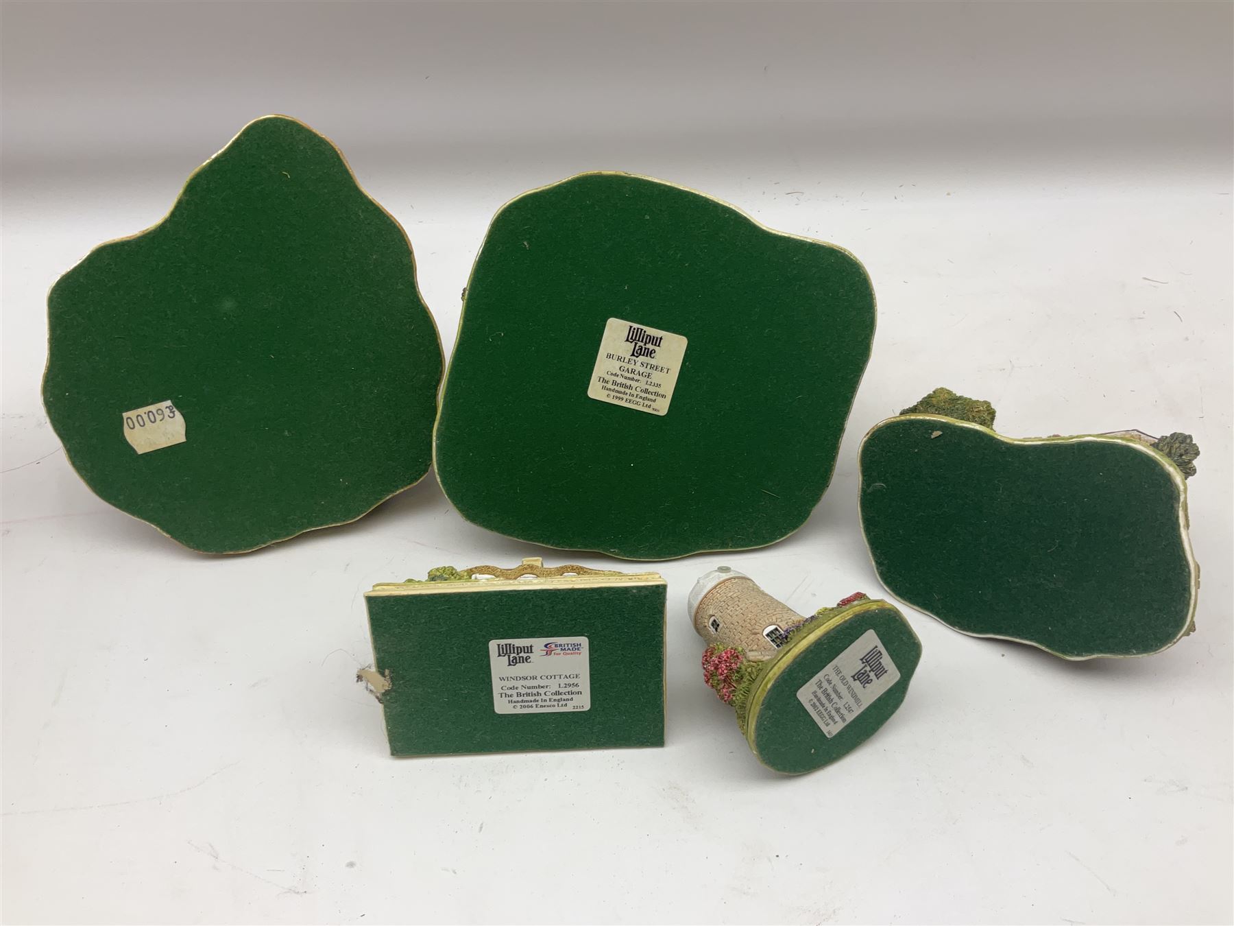 Five Lilliput lanes, comprising Burley Street Garage, Windsor Castle, Playtime, Fireman's Watch and The Old Windmill