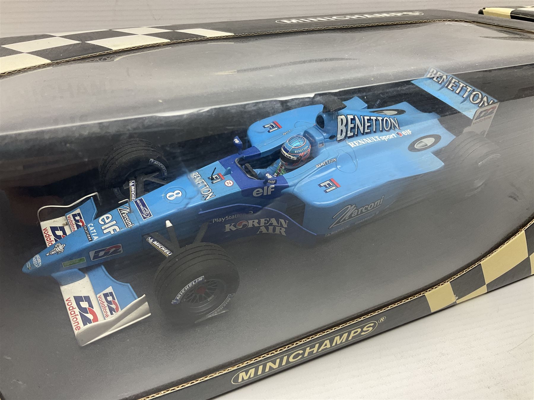 Three Minichamps 1:18 scale die-cast racing cars - B.A.R. Honda 006 J. Button; limited edition Benetton Renault Sport Showcar 2001 J. Button; and limited edition Benetton Renault Sport Showcar 2001 G. Fisichella; all boxed (3)