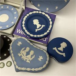 Collection of Wedgwood Jasperware, to include black Eisenhower Bust, two black basalt paperweights, one depicting an eagle and one depicting Julius Caesar, a blue Zodiac plate, Man on the Moon commemorative plate, American Independence Bicentennial plate and Royal commemorative ware, etc, all with impressed marks beneath, some with boxes