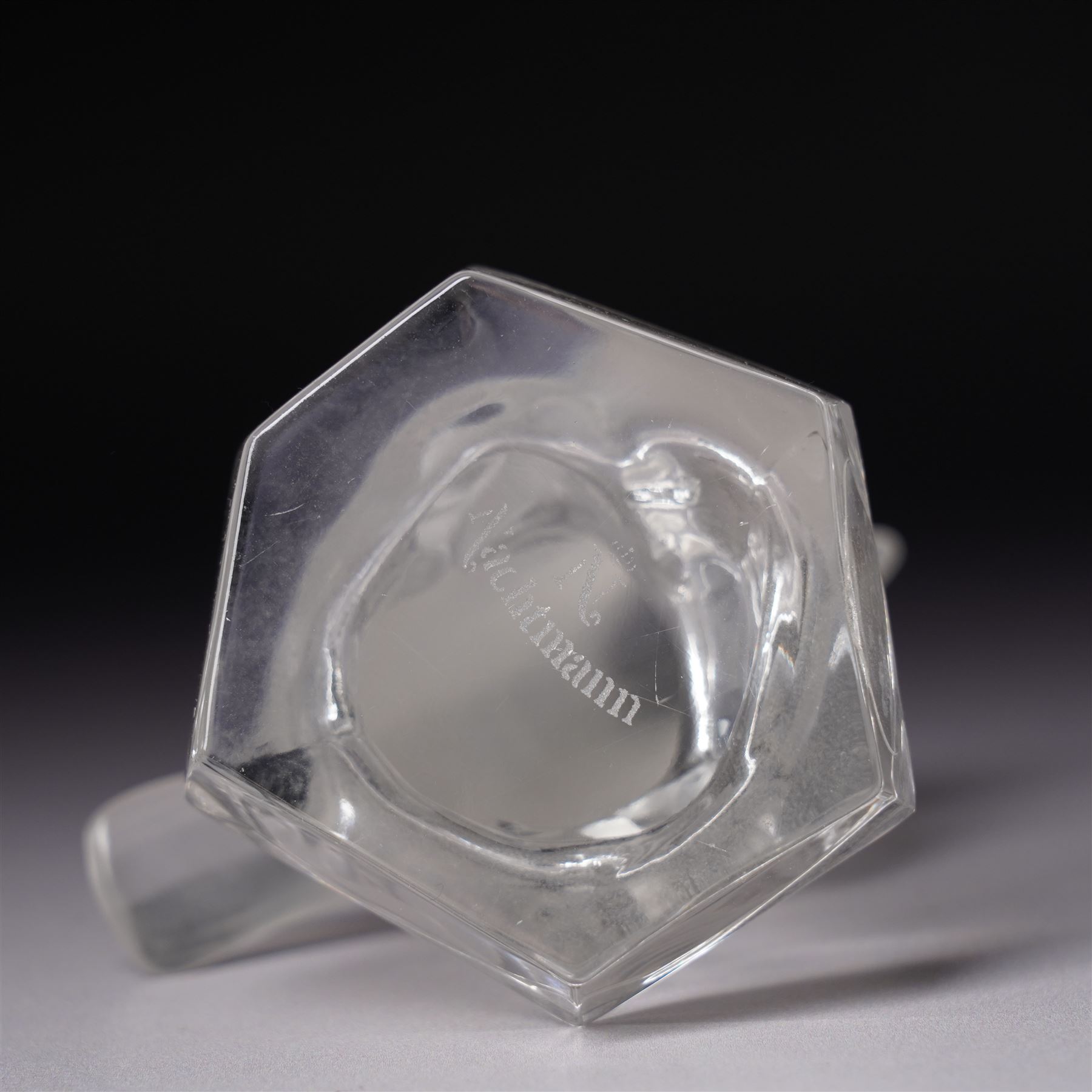 Baccarat figurine of a golfer, depicting a golfer in mid-swing, together with Nachtmann bird, golfer H24cm