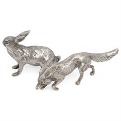 German silver model of a prowling fox, stamped Germany Sterling to underside of tail, together with a Continental silver model of a hair, with London import mark for 1971, tallest H6cm 