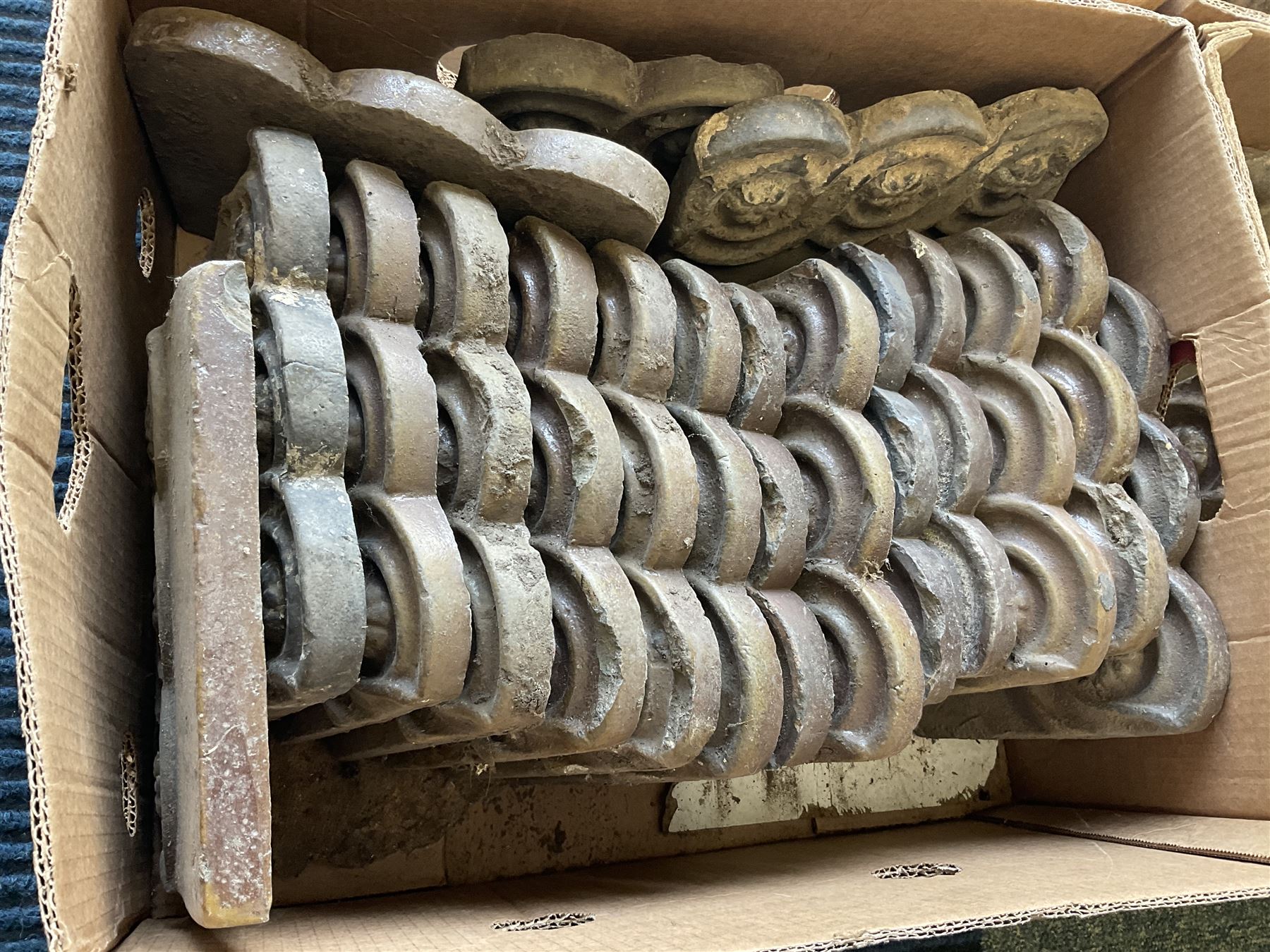 Victorian terracotta garden edging tiles, with floral decoration, each