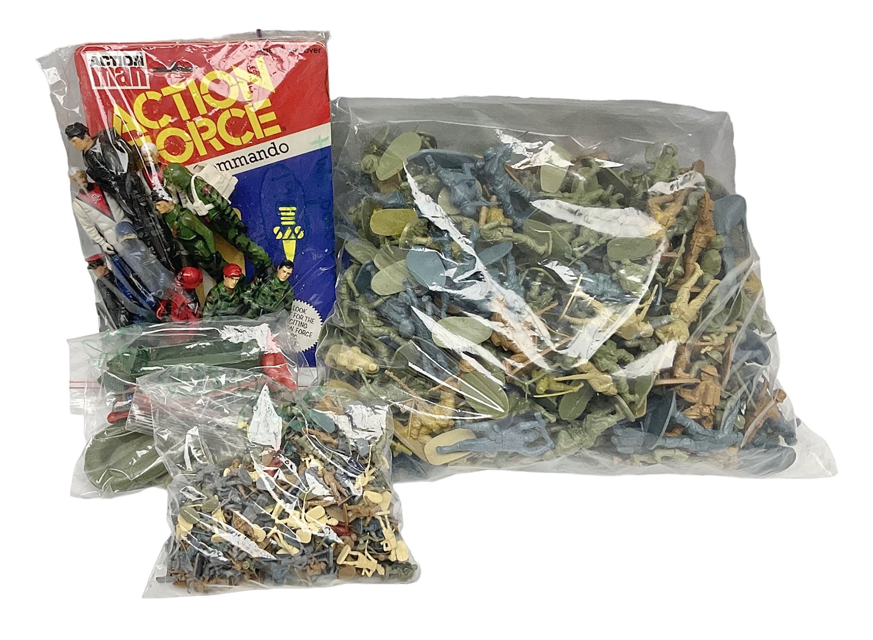 Ten 1980s Action Man Action Force figures with six original card backs; over three-hundred and forty Airfix large scale plastic soldiers; over two-hundred and thirty small scale plastic soldiers; together with accessories including boats, ladder etc