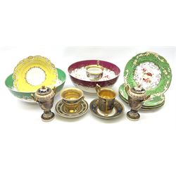 A group of assorted ceramics, to include a pair of small Vienna urns and covers decorated with hand painted figural panels and heightened with gilt, four matching Victorian plates, with central hand painted floral sprays within a green and pierced border, a similarly decorated Victorian bowl, similar bowl with claret border, Continental cup and saucer, the cup decorated with printed scene and raised upon three paw feet, etc. 