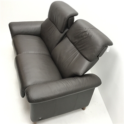 Stressless two seat sofa upholstered in a chocolate leather, shaped supports, W180cm