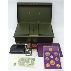  Great British coins in a green painted metal strong box Page one pound note 'DY08', 1970 coinage of Great Britain proof set, commemorative crowns etc  