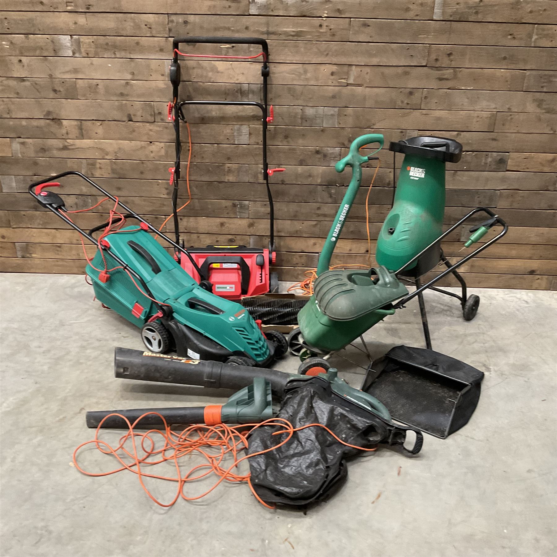 A Bosch Rotak 34R lawn mower, a Bergman Pro 3in1 Scarficer, Rake & Sweeper, a Black &Decker GS1800 chipper, a strimmer and a blower
