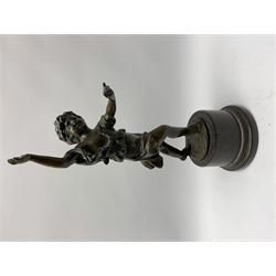 After E Plat, bronze modelled as a dancing child, signed E. Plat, upon cylindrical black marble base, H40cm