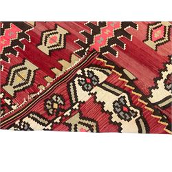Large  red ground Kilim rug or wall hanging, decorated with geometric patterns and dated within the weave '1969'
