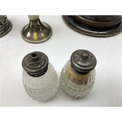 Four 19th century silver plated wine bottle coasters, together with hallmarked silver collared and lidded glass cruet trio and ornate silver cruet holder missing liner, with handle, and other silver plate etc