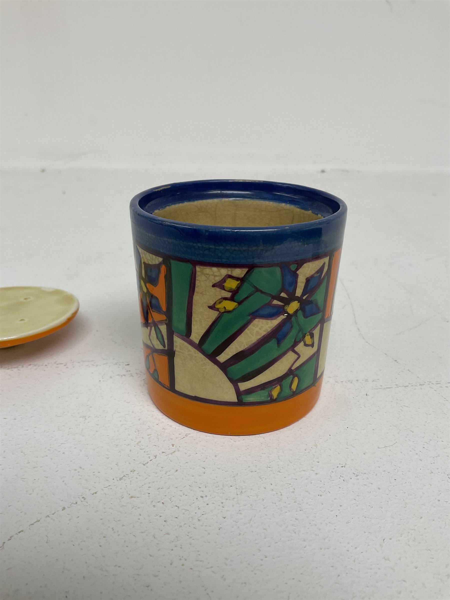 Clarice Cliff Fantasque for Wilkinson Pottery preserve pot, circa 1928, of drum form decorated in Sunray Leaves pattern, H8cm