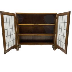 Mid 20th century oak bookcase, lead glazed doors