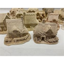 Twenty-three Lilliput Lane models from the Paint Your Own collection, to include Catmint Cottage, Sugar and Spice, Gypsy Cottage, Ruby Cottage and Little Birch, some boxed