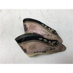 French silver plated wine taster of typical form, stamped, together with a silver plated napkin ring, and an 'Alpaca Silver' pill box with mother of pearl detailed cover, (3) together with Two pairs of late 19th/early 20th century Chinese Lotus shoes for binding feet, the first with purple silk heavily embroidered with ornate floral motifs, L10cm the second larger fuschia and black pair with thicker sole embroidered with flowers, L14cm