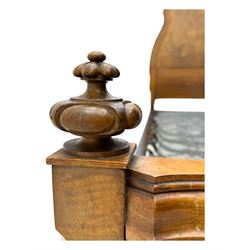 Mid-20th century walnut single bedstead, high shaped headboard, footboard with turned finials and scrollwork carvings, complete with 'Vono' iron frame, raised on cabriole supports