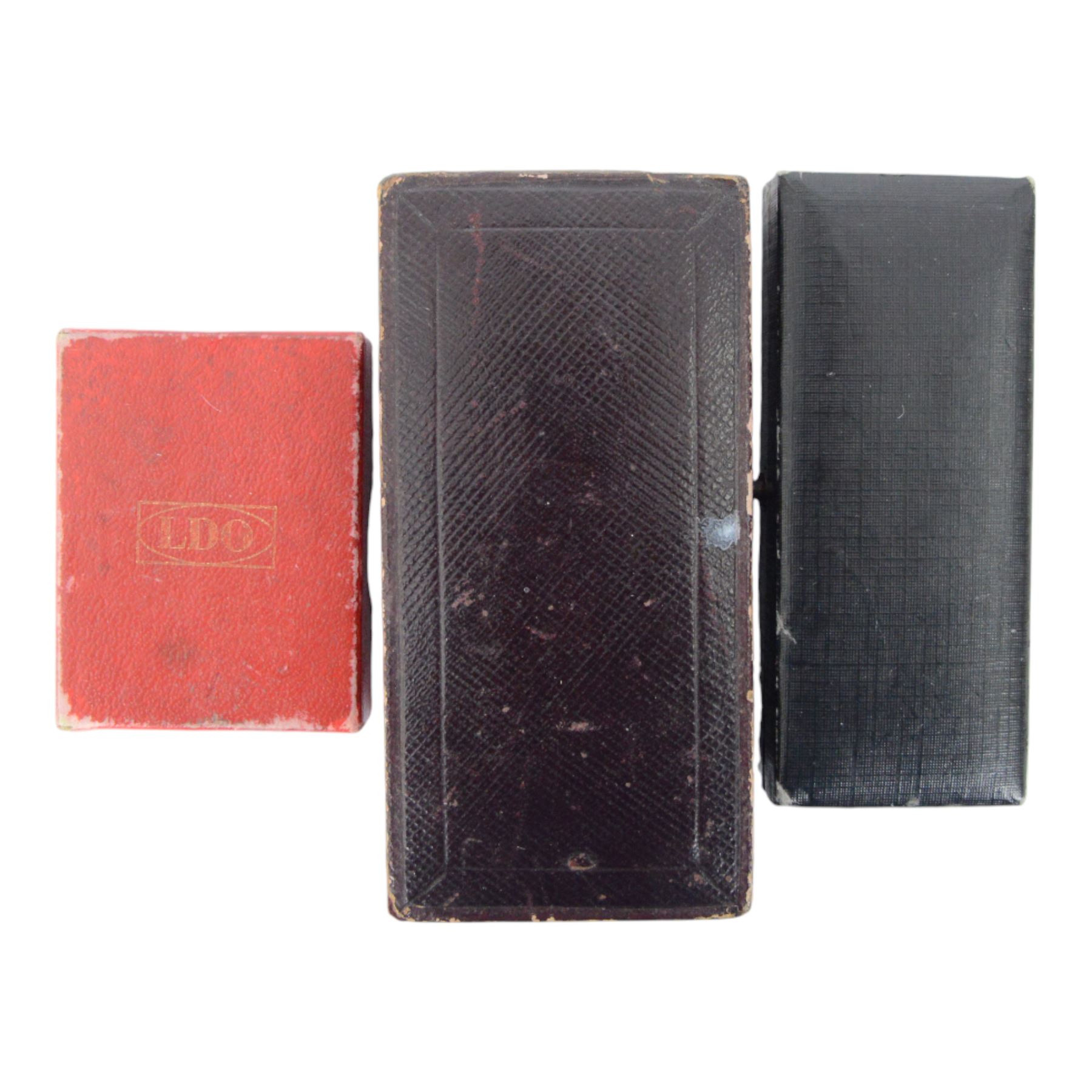 Collection of fifteen worldwide award/medal empty boxes and cases, including examples from USA, Germany, Japan, Greece, Belgium, N.Korean etc
