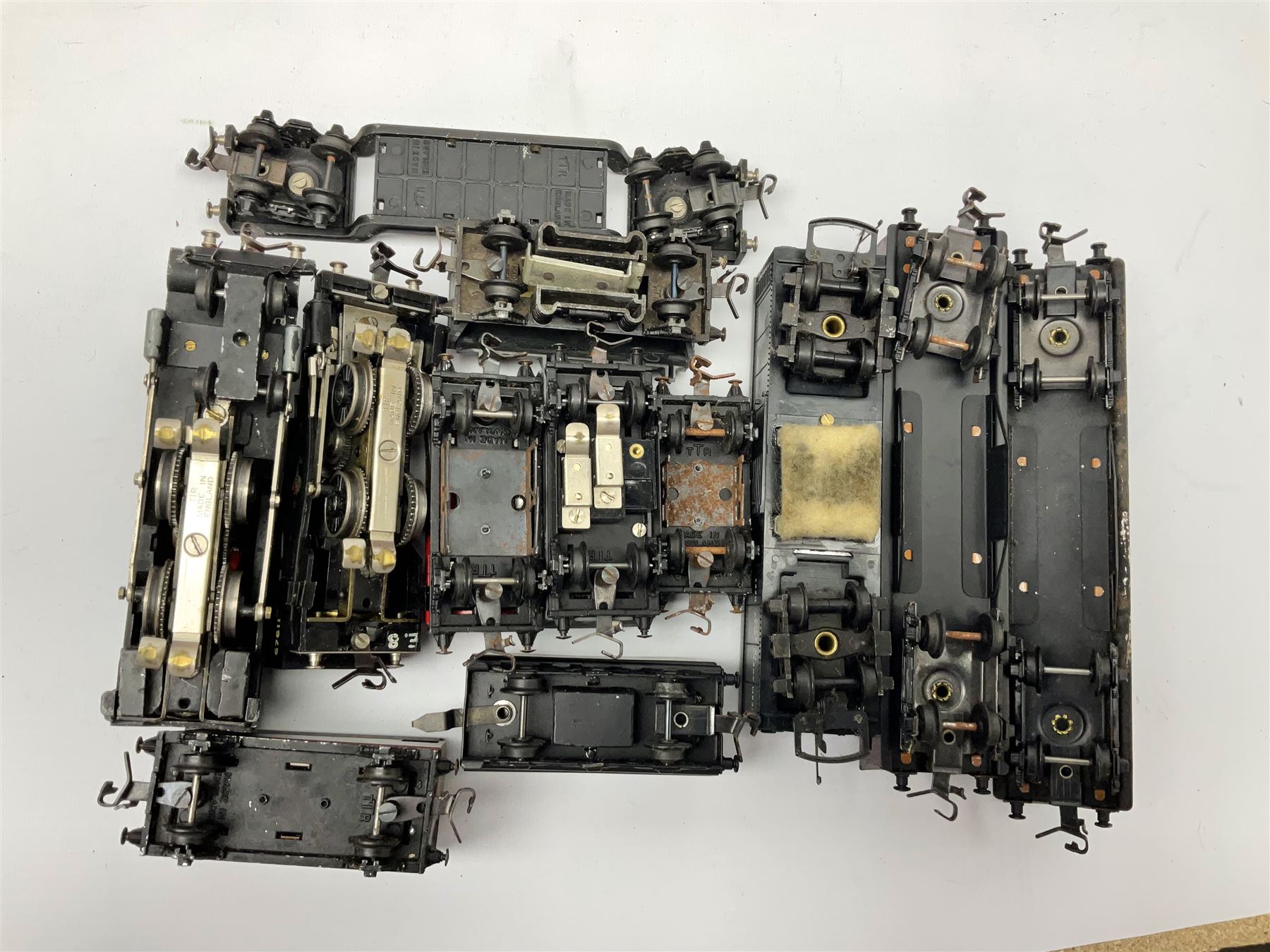 Trix Twin Railway - Hunt Class 4-4-0 locomotive and tender 'Pytchley' No.62750, boxed; 0-4-0 tank locomotive with plastic body No.67611; three passenger coaches (one boxed); six goods wagons; three boxed Yard Lamps etc; and Tri-ang Track Cleaning Car, boxed