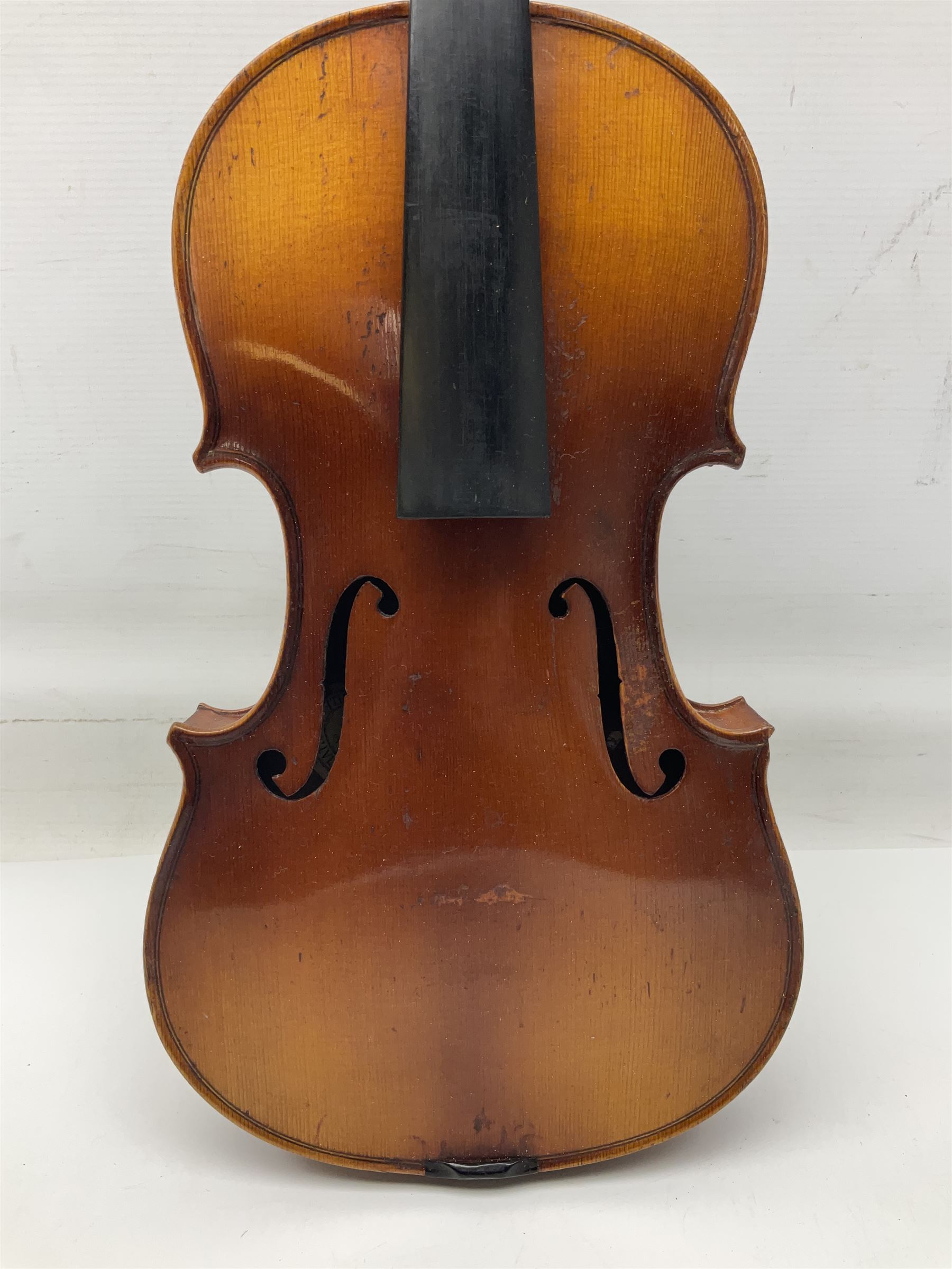 Saxony (?) violin c1950 with 36cm two-piece maple back and ribs and spruce top; bears label 'The Maidstone School Orchestra Association' L59cm overall; and 1950s Czechoslovakian violin for restoration; both in carrying cases (2)