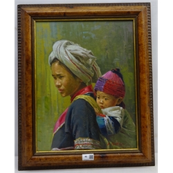  A Phanich (Thailand 20th century): Mother with Child on her Back, oil on canvas signed 45cm x 34cm  