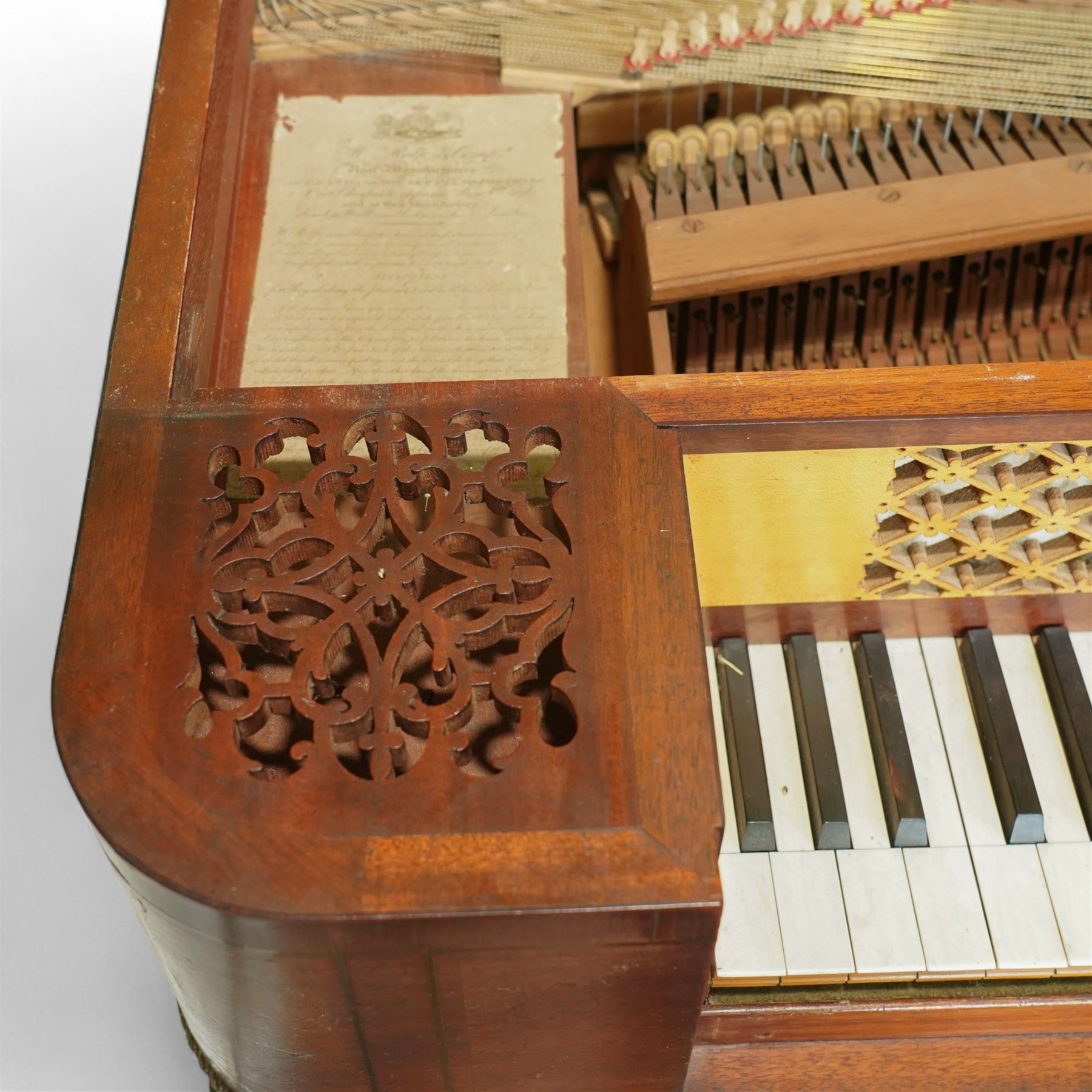 Early 19th century George IV Square Piano by William Rolfe & Co, 112 Cheapside, London, c1821. Mahogany veneered case with rosewood crossbanding and brass stringing, with sustain pedal and reeded legs on a tapered spiral with brass capitals, with three music draws beneath and a folding duet music stand, nameboard with makers name on a round gilt medallion and open silk backed fretwork to the ends, serial No 6699, double strung, English double action with 68 ivory and ebony keys, F1-C7. original strings, hammers and dampers, soundboard and bridge in good condition, with original makers written instructions on regulating the action and tuning the piano attached to the inside of the instrument. In good condition, however the action is in need of regulation and tuning.
William Rolfe is thought to have been in business between 1785 and 1828. 
Given the intricate nature of these historic instruments, specialist support will be available if required, to assist successful buyers with safe removal and onward handling. Price upon application.


This item has been registered for sale under section 10 of the APHA Ivory Act Reference PB6GL6SZ