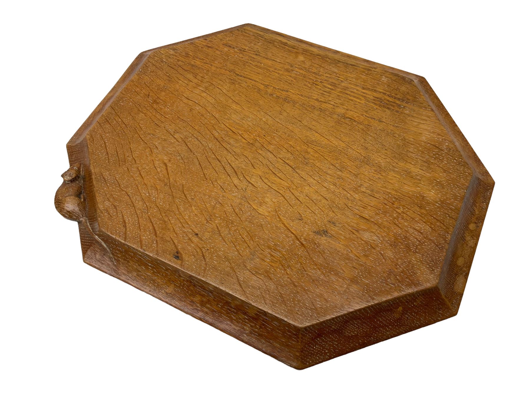 Mouseman adzed oak breadboard, canted rectangular form with moulded