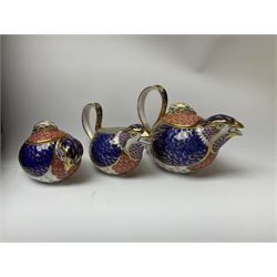 A Royal Crown Derby Quail teaset, comprising teapot, milk jug, and sucrier, all modelled in the form of quails, two cups, two saucers, and two side plates, decorated in the Imari palette, with printed marks beneath, in fitted makers box. 
