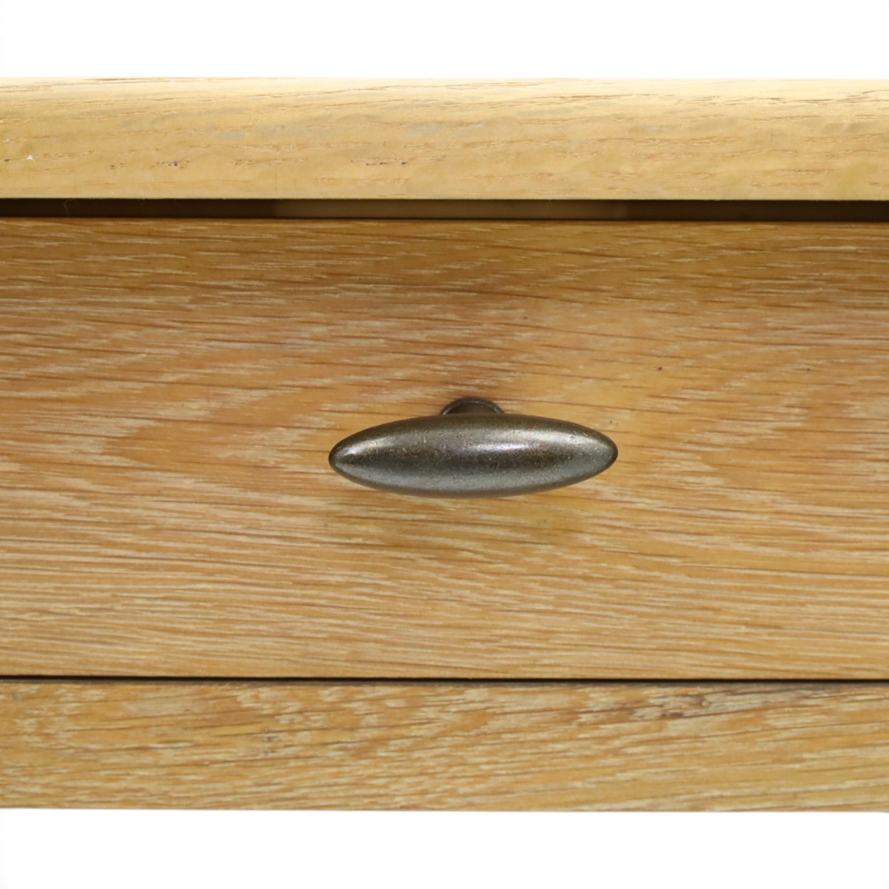 Neptune - 'Edinburgh' limed oak console table, with two
soft close drawers raised on ring-turned column supports,
with a pot shelf raised on square feet