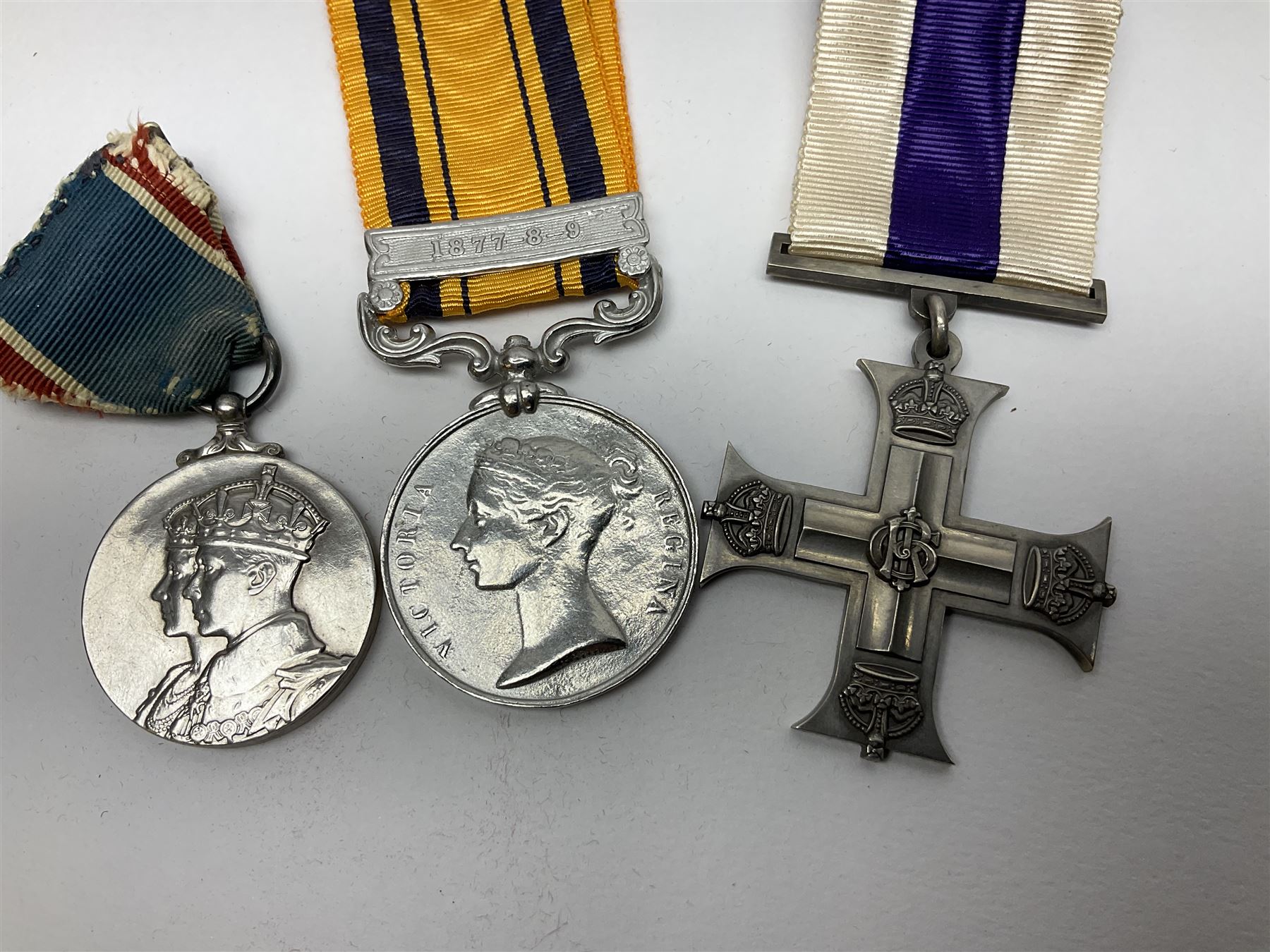 Imperial Service Medal awarded to James Roscow; four coronation medals for Edward VII, George VI and two Elizabeth II (both boxed); George V silver jubilee miniature; and two replica medals - Military Cross and Victoria South Africa 1877-8-9 (8)