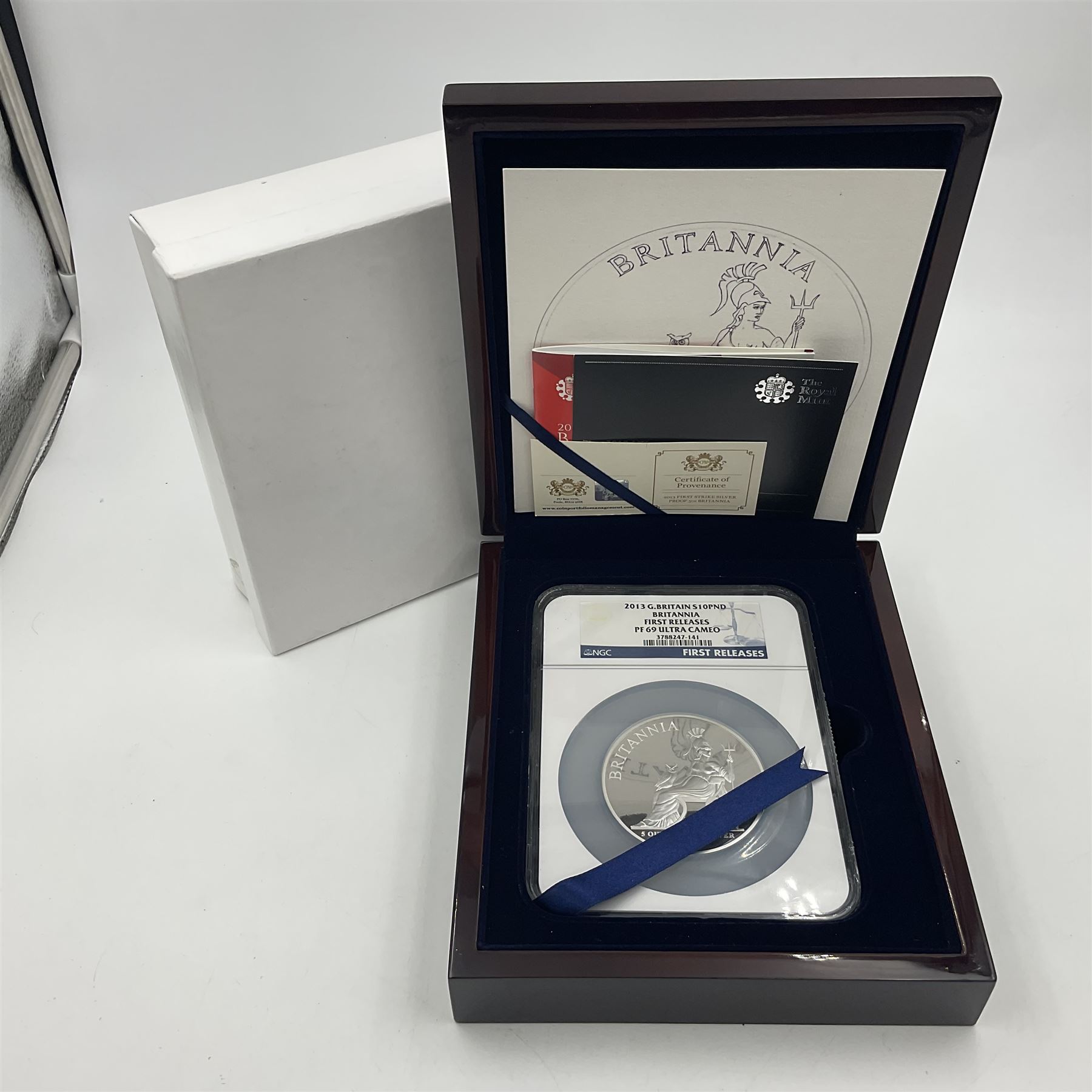 The Royal Mint United Kingdom 2013 'Britannia First Strike' five ounce fine silver proof coin, encapsulated and graded by NGC 'First Releases PF 69 Ultra Cameo', cased with certificates
