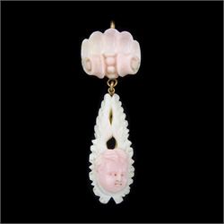 19th century gold Conch shell pendant, carved bust portrait of a child, within a foliate setting, suspending from a conch shell design pendant