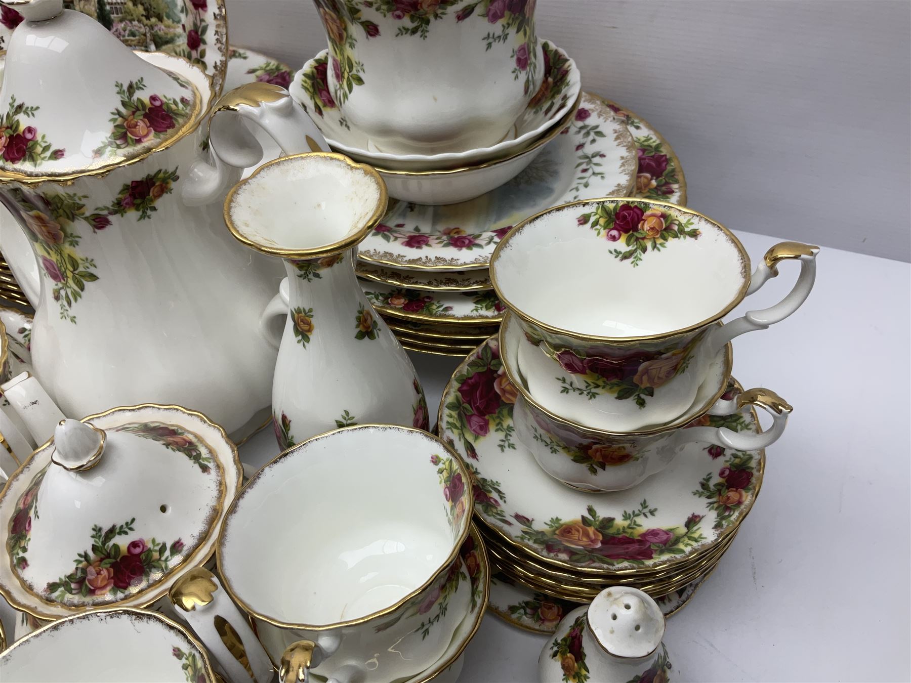 Royal Albert Old Country Roses pattern part tea and dinner service, including coffee pot, miniature teapot and stand, eight dinner plates, cake stand, sauce boat etc 