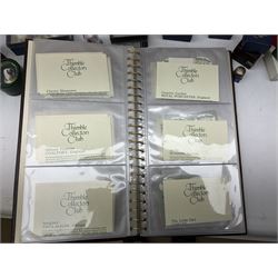 Quantity of thimbles to include twelve Irish Dresden lace examples, Royal Crown Derby, Spode, Portmeirion, Wedgwood, Royal Grafton etc, together with three display cases, many with certificates