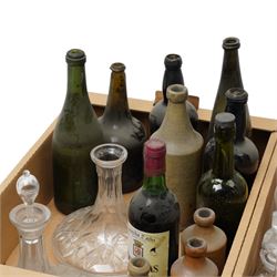 Glass dome shade, various glass decanters and coloured glass bottles