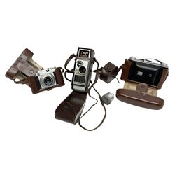 Ensign Ranger II folding roll film camera, Beirette Junior II camera and Bell & Howell 624 EE Autoset hand-wind cine camera, all in cases