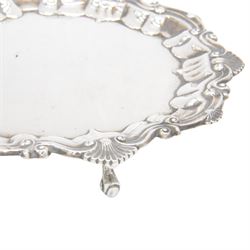 Edwardian silver waiter, of typical form with palmette and C scroll rim, upon three scroll feet, hallmarked Chester 1909, maker's mark MEB over FEB, W23cm