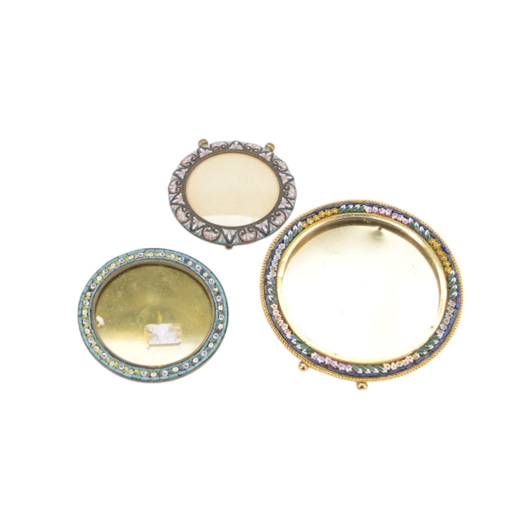 Six micro mosaic picture frames, all decorated with flowers with blue and green boarders 