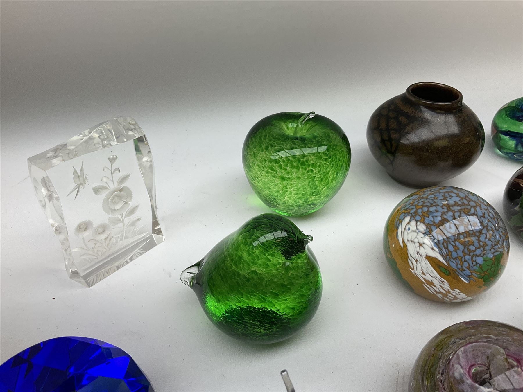 Collection of glass paperweights to include three Wedgwood examples modelled as birds, two Rosenthal faceted examples, a millefiori example, together with art glass examples to include Eirian swirled teardrop and another teardrop shaped paperweight by Caithness